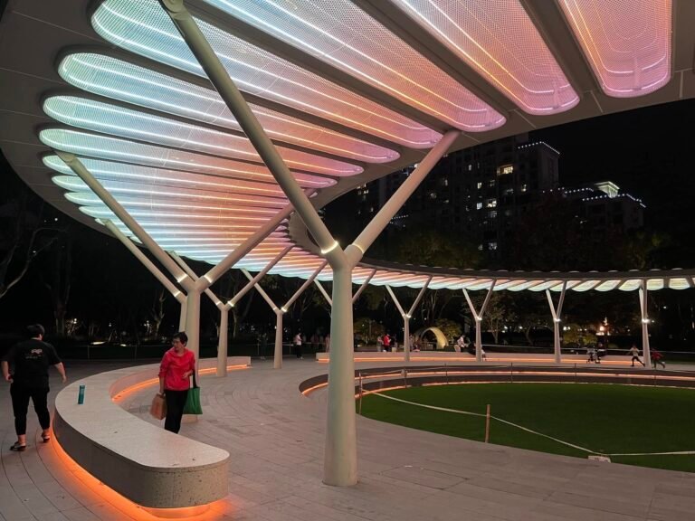 Hongqiao Park Origin Pavilion illuminated at night with ETFE membrane canopy in Changning Shanghai